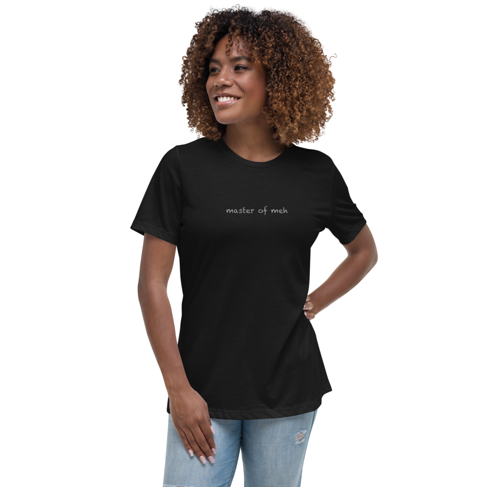 "Master of meh" printed on a black women's relaxed t-shirt worn by a female