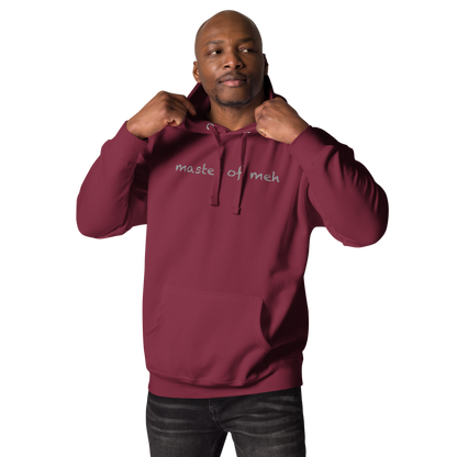 "Master of meh" printed on a maroon unisex hoodie worn by a male