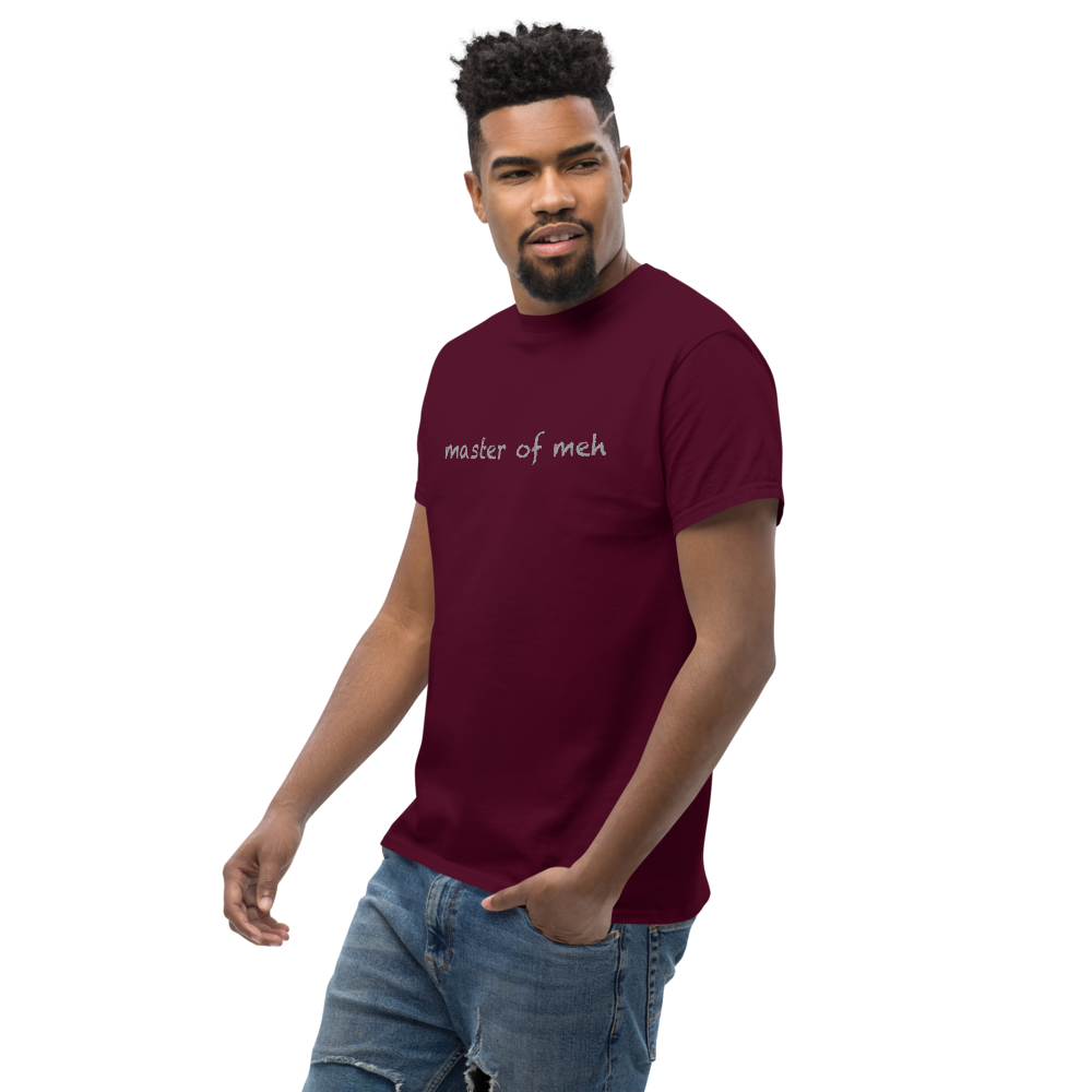"Master of meh" printed on a maroon unisex classic tee worn by a male