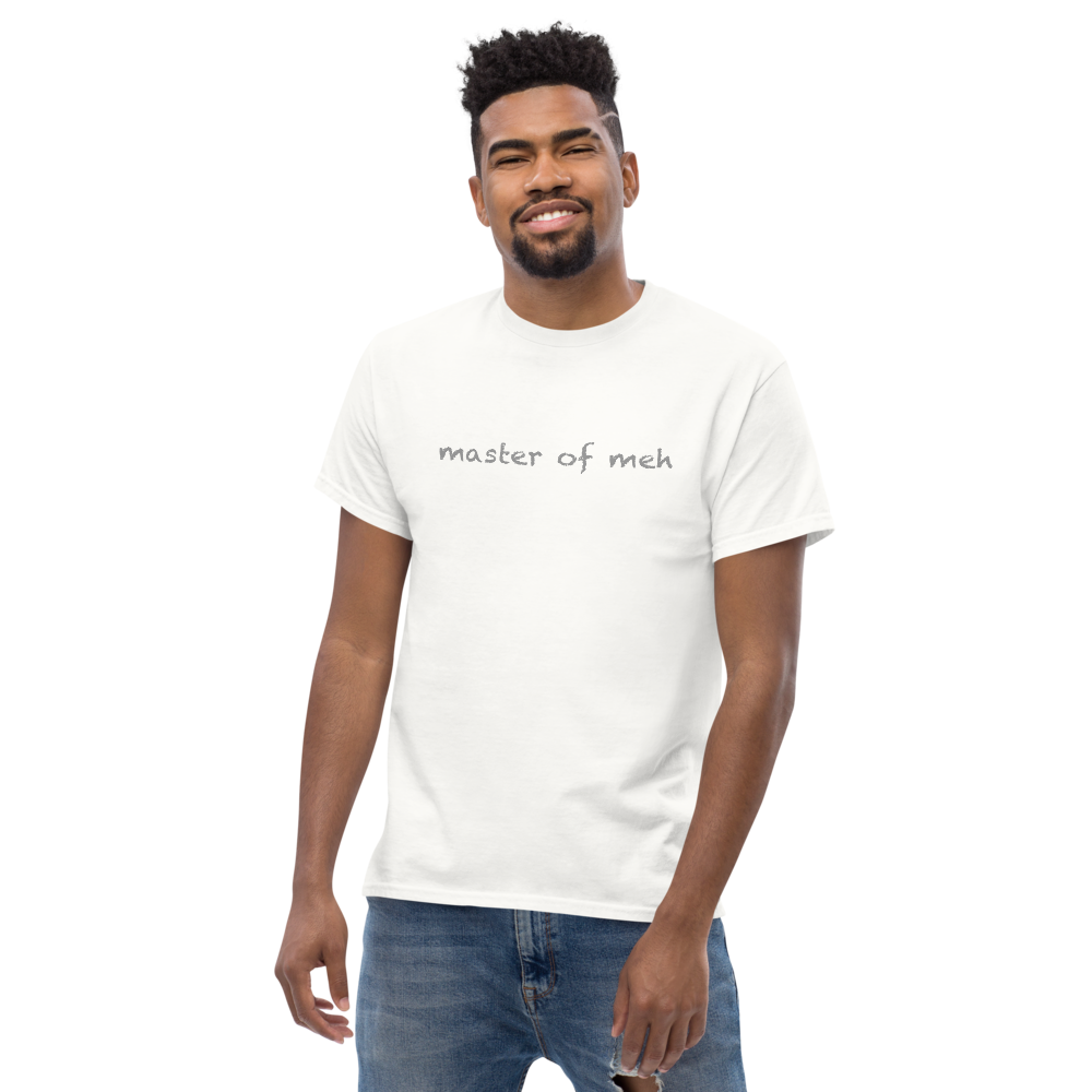 "Master of meh" printed on a white unisex classic tee worn by a male