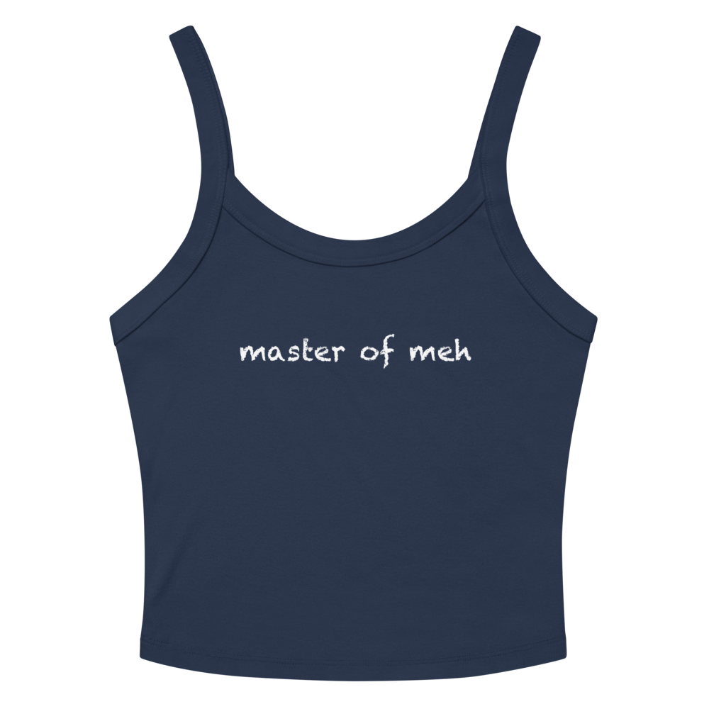 "Master of meh" printed on a solid navy blend women's micro-rib tanktop laying on a flat surface amongst sunglasses and shorts
