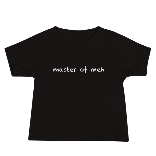 "Master of meh" printed on a black baby jersey short sleeve tee laying on a flat surface