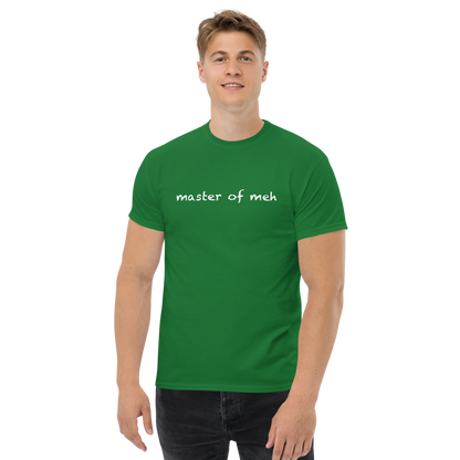 "Master of meh" printed on a turf green unisex classic tee worn by a male