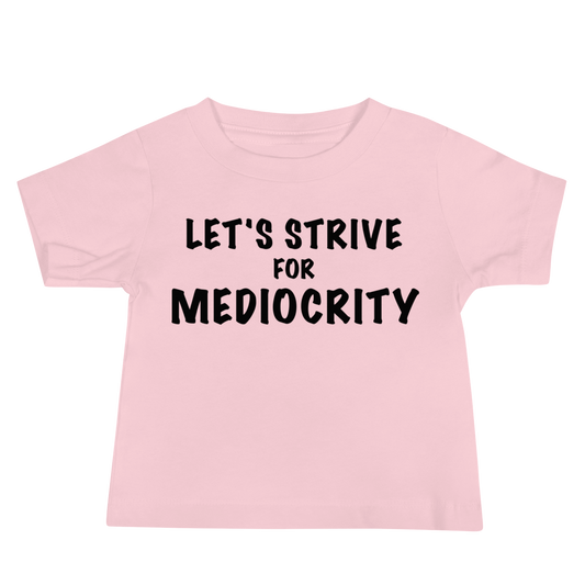 "Let's strive for mediocity" printed on a pink baby jersey short sleeve tee laying on a flat surface