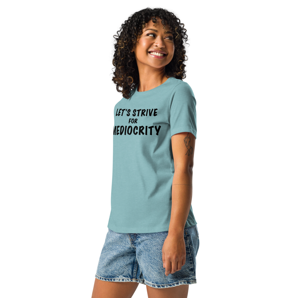 "Let's strive for mediocity" printed on a heather blue lagoon women's relaxed t-shirt worn by a female