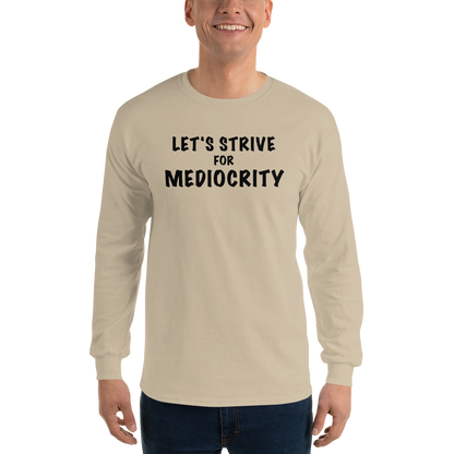 "Let's strive for mediocity" printed on a sand men's long sleeve shirt worn by a male
