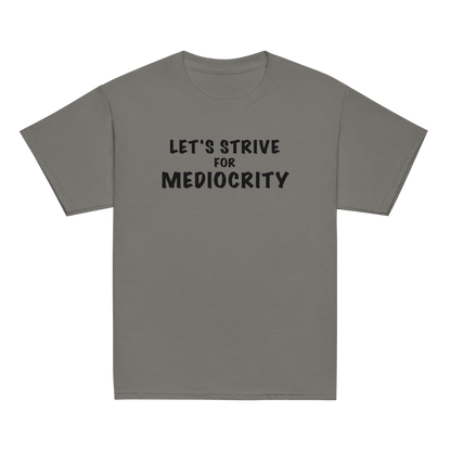 "Let's strive for mediocity" printed on a charcoal youth classic tee laying on a flat surface