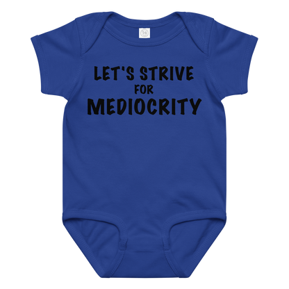 "Let's strive for mediocity" printed on a royal baby jersey bodysuit laying on a flat surface amongst other clothes