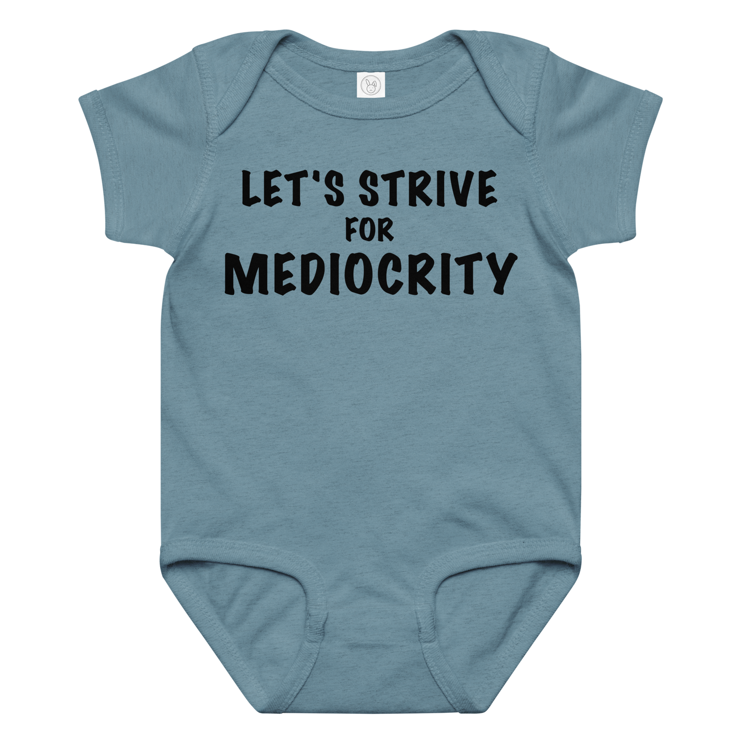 "Let's strive for mediocity" printed on a vintage indigo baby jersey bodysuit laying on a flat surface amongst other clothes