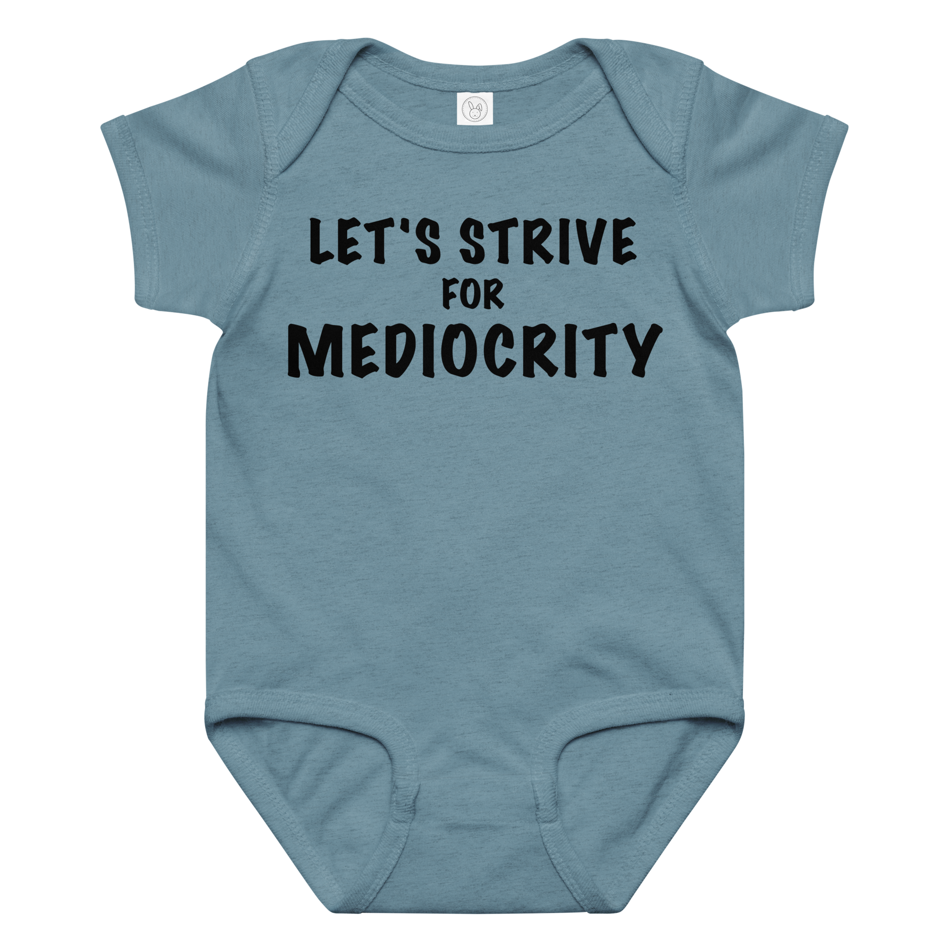 "Let's strive for mediocity" printed on a vintage indigo baby jersey bodysuit laying on a flat surface amongst other clothes