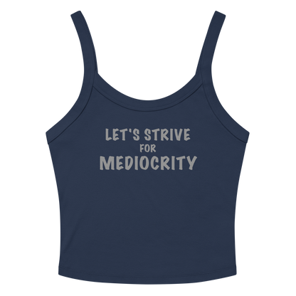 "Let's strive for mediocity" printed on a solid navy blend women's micro-rib tanktop laying on a flat surface amongst sunglasses and shorts