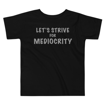 "Let's strive for mediocity" printed on a black toddler short sleeve tee laying on a flat surface