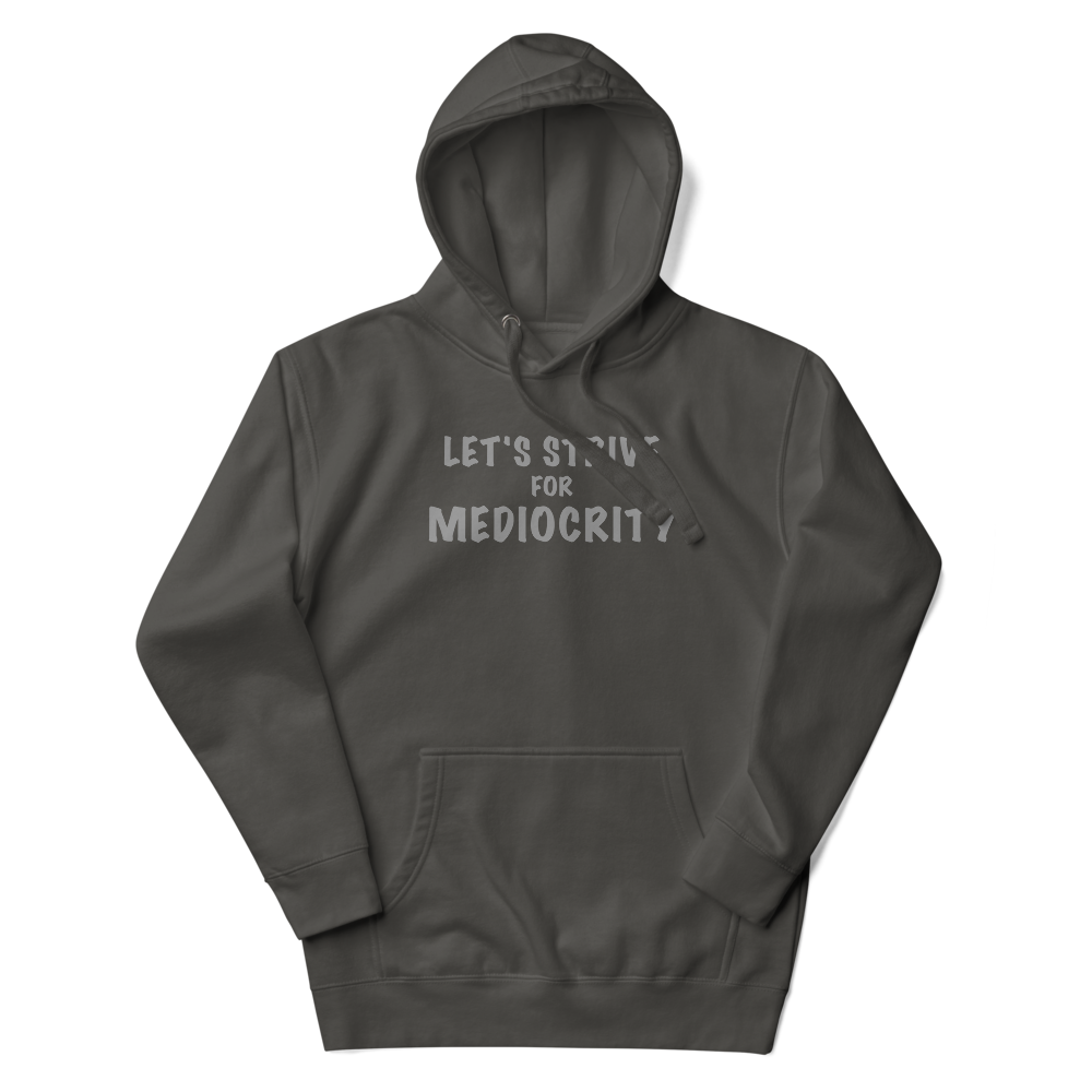 "Let's strive for mediocity" printed on a vintage black unisex hoodie laying on a flat surface with the hood up