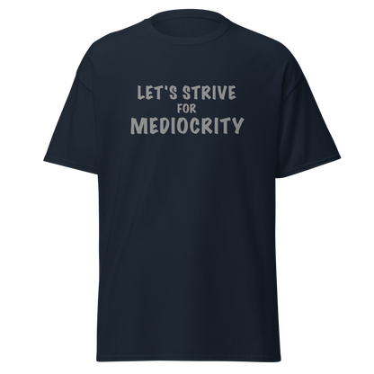 "Let's strive for mediocity" printed on a navy unisex classic tee laying on a flat surface
