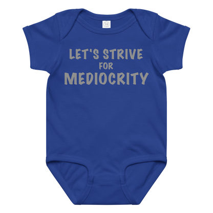 "Let's strive for mediocity" printed on a royal baby jersey bodysuit laying on a flat surface amongst other clothes