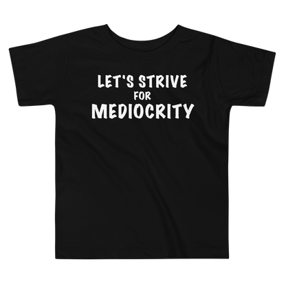 "Let's strive for mediocity" printed on a black toddler short sleeve tee laying on a flat surface