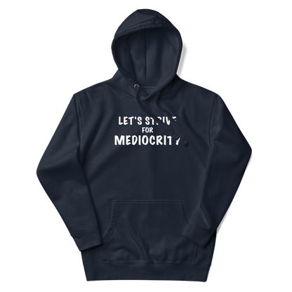 "Let's strive for mediocity" printed on a navy blazer unisex hoodie laying on a flat surface with the hood up
