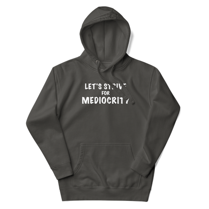 "Let's strive for mediocity" printed on a vintage black unisex hoodie laying on a flat surface with the hood up