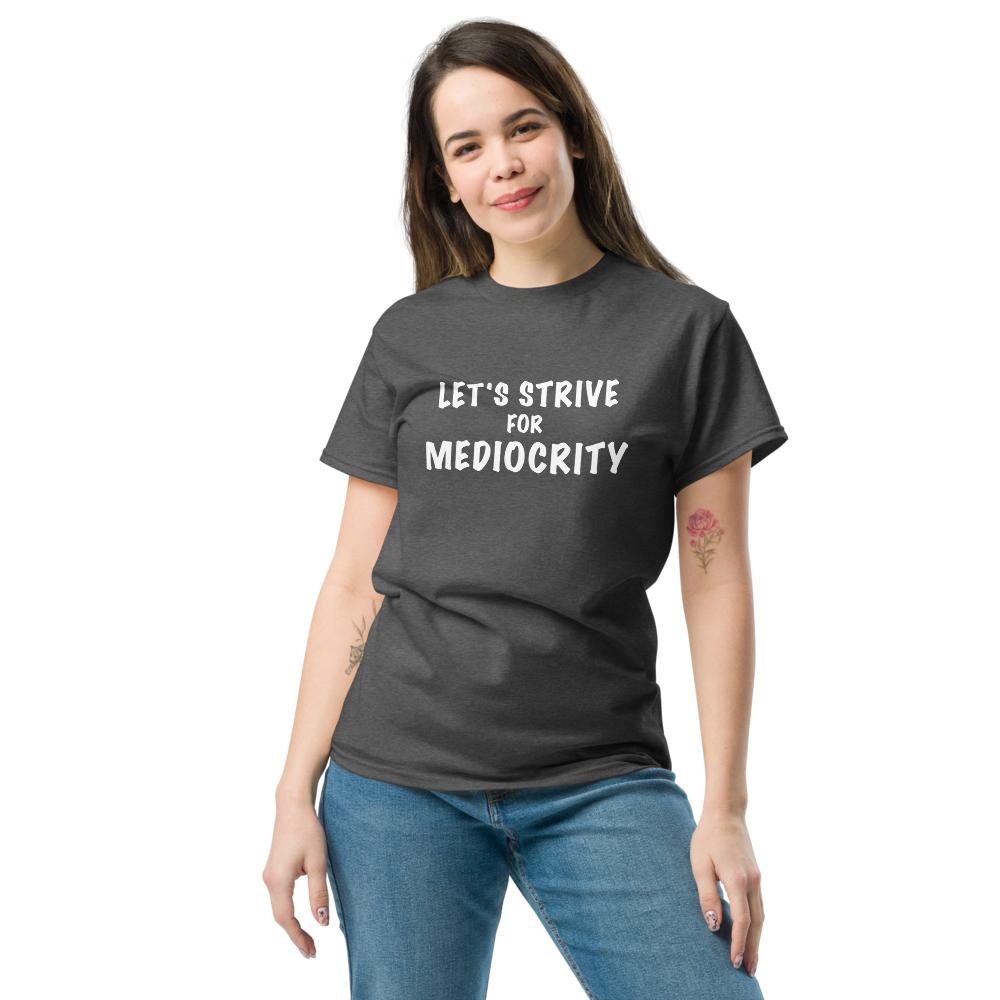 "Let's strive for mediocity" printed on a dark heather unisex classic tee worn by a female