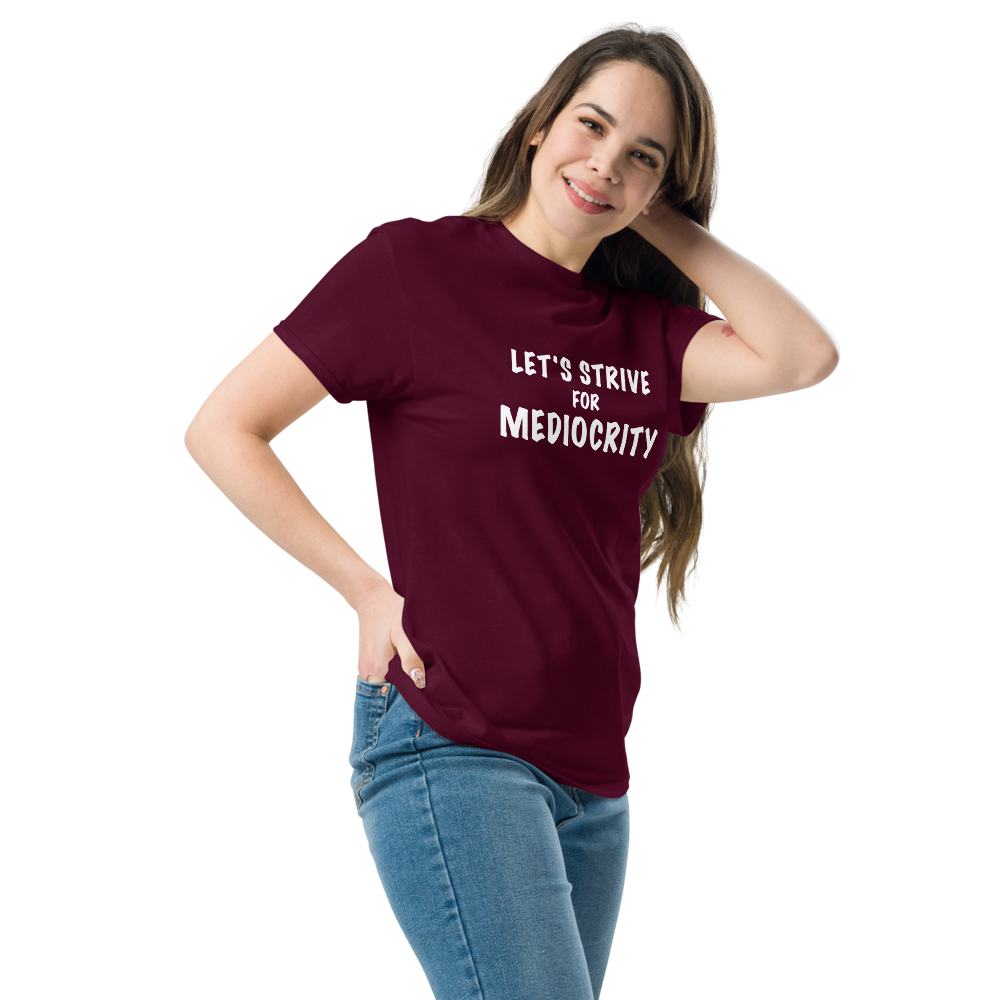 "Let's strive for mediocity" printed on a maroon unisex classic tee worn by a female