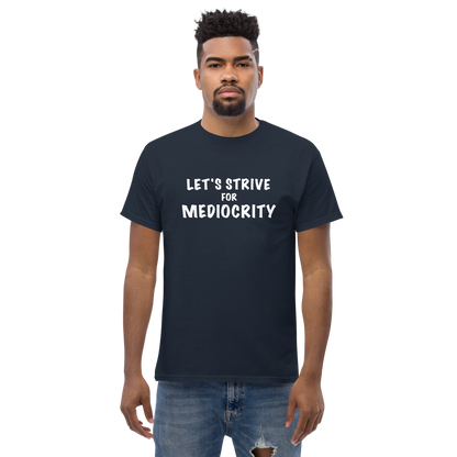 "Let's strive for mediocity" printed on a navy unisex classic tee worn by a male