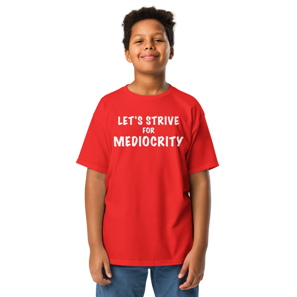 "Let's strive for mediocity" printed on a red youth classic tee worn by a male