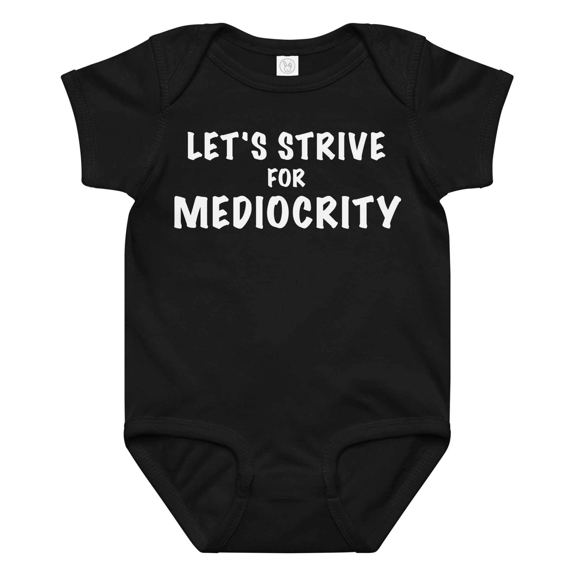 "Let's strive for mediocity" printed on a black baby jersey bodysuit laying on a flat surface amongst other clothes