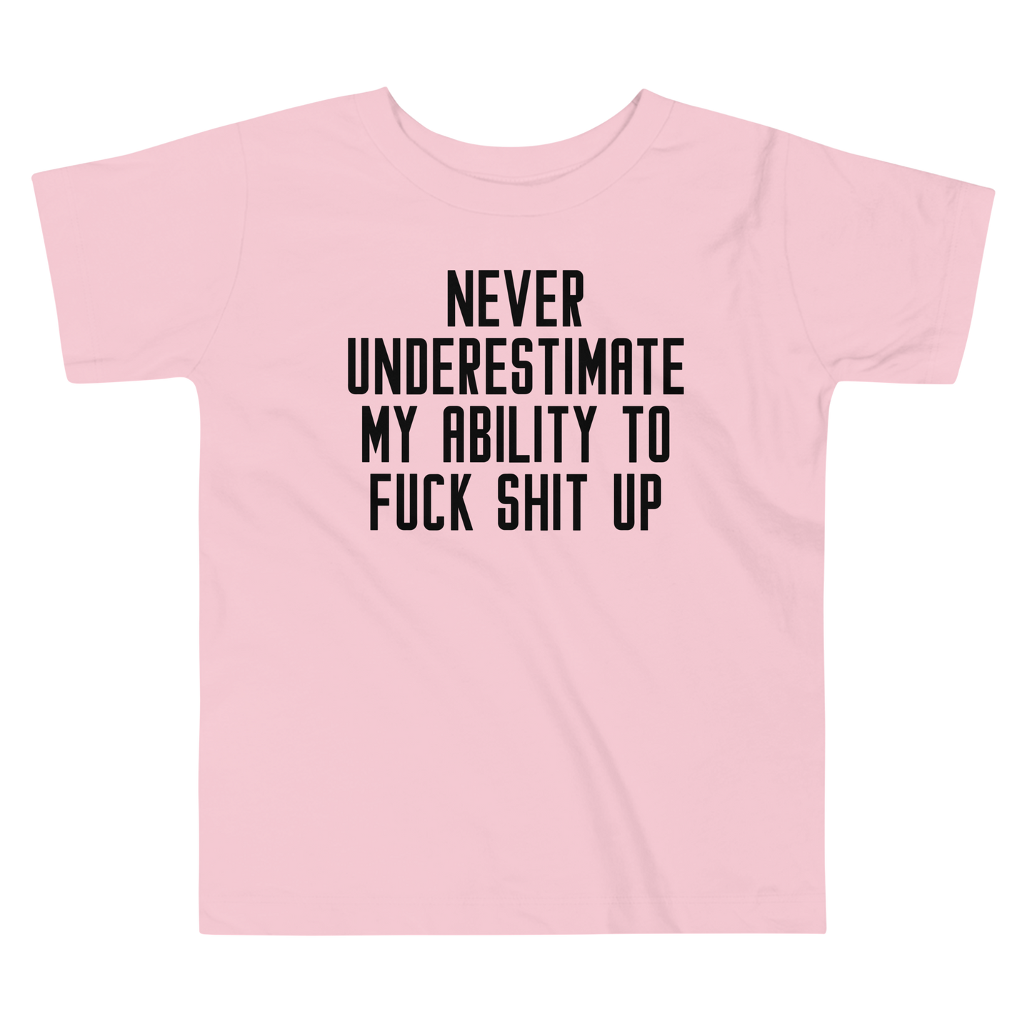 "Never Understimate My Ability To Fuck Shit Up" printed on a pink toddler short sleeve tee laying on a flat surface