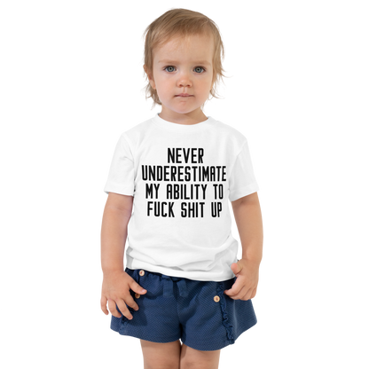 "Never Understimate My Ability To Fuck Shit Up" printed on a white toddler short sleeve tee worn by a female