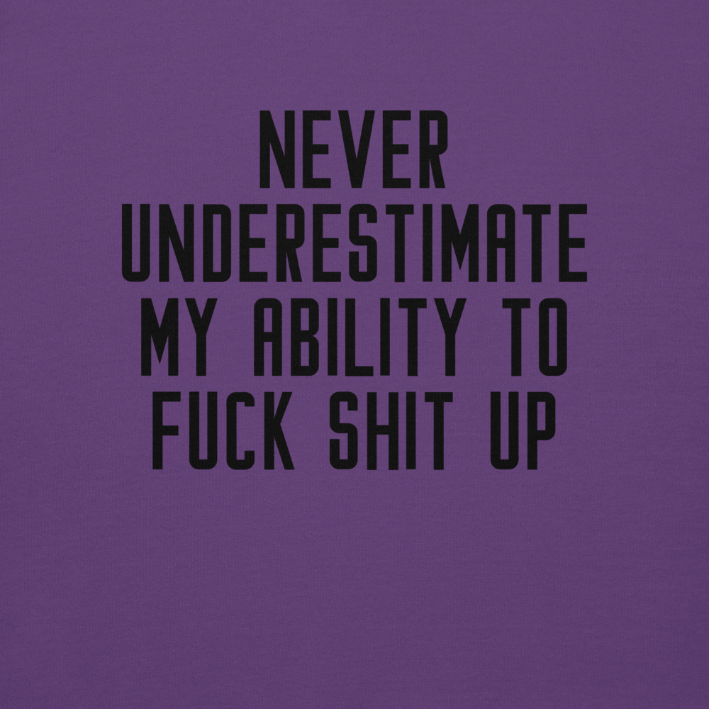 "Never Understimate My Ability To Fuck Shit Up" printed on a purple background