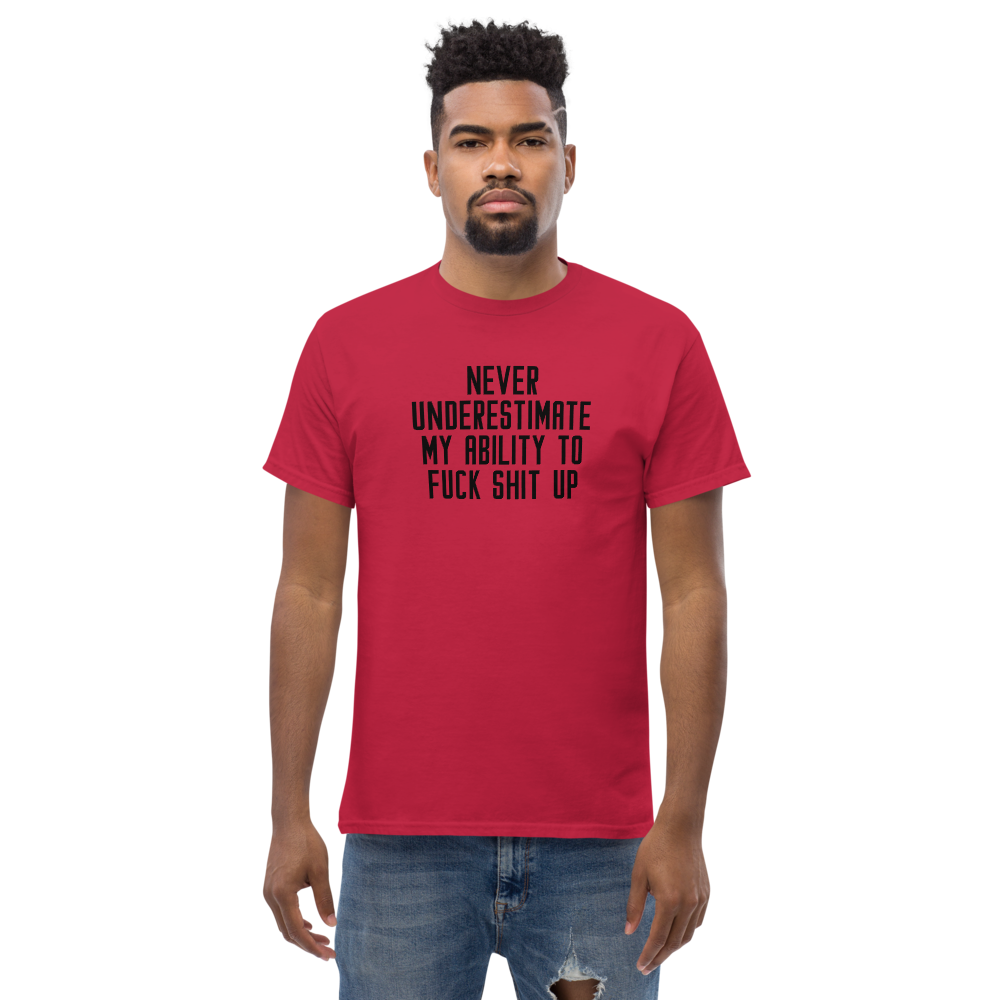 "Never Understimate My Ability To Fuck Shit Up" printed on a cardinal unisex classic tee worn by a male