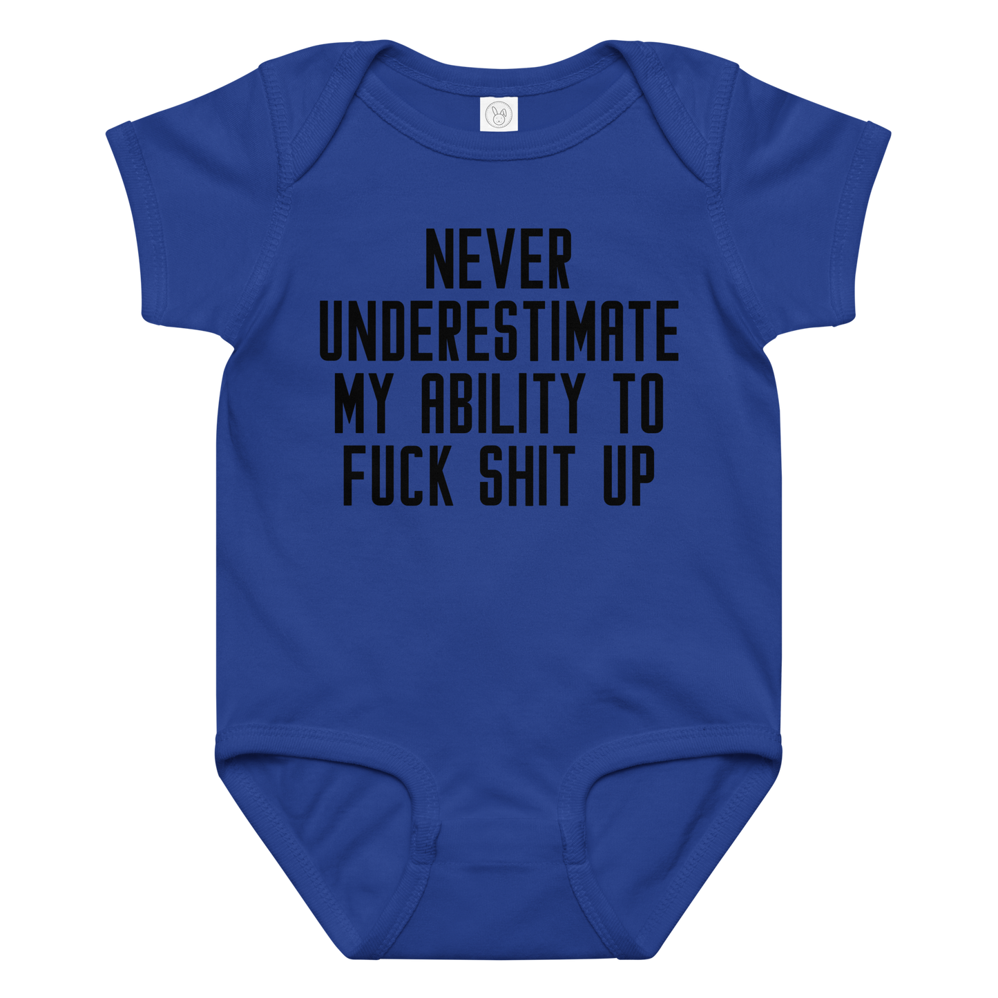 "Never Understimate My Ability To Fuck Shit Up" printed on a royal baby jersey bodysuit laying on a flat surface amongst other clothes