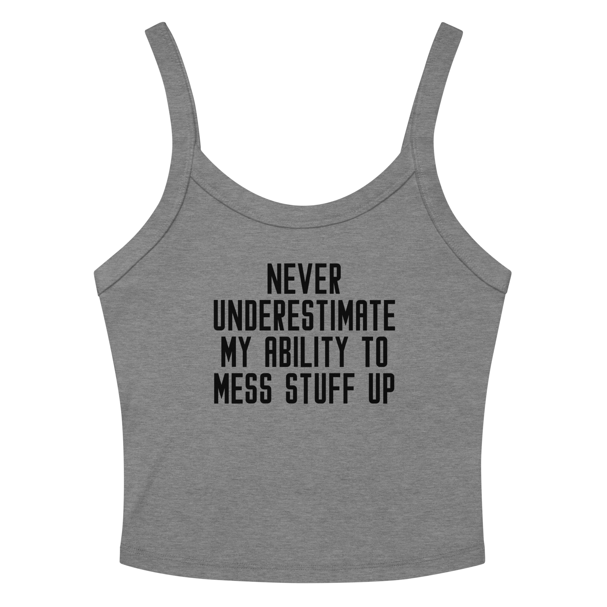 "Never Understimate My Ability To Mess Stuff Up" printed on a athletic heather women's micro-rib tanktop laying on a flat surface amongst sunglasses and shorts