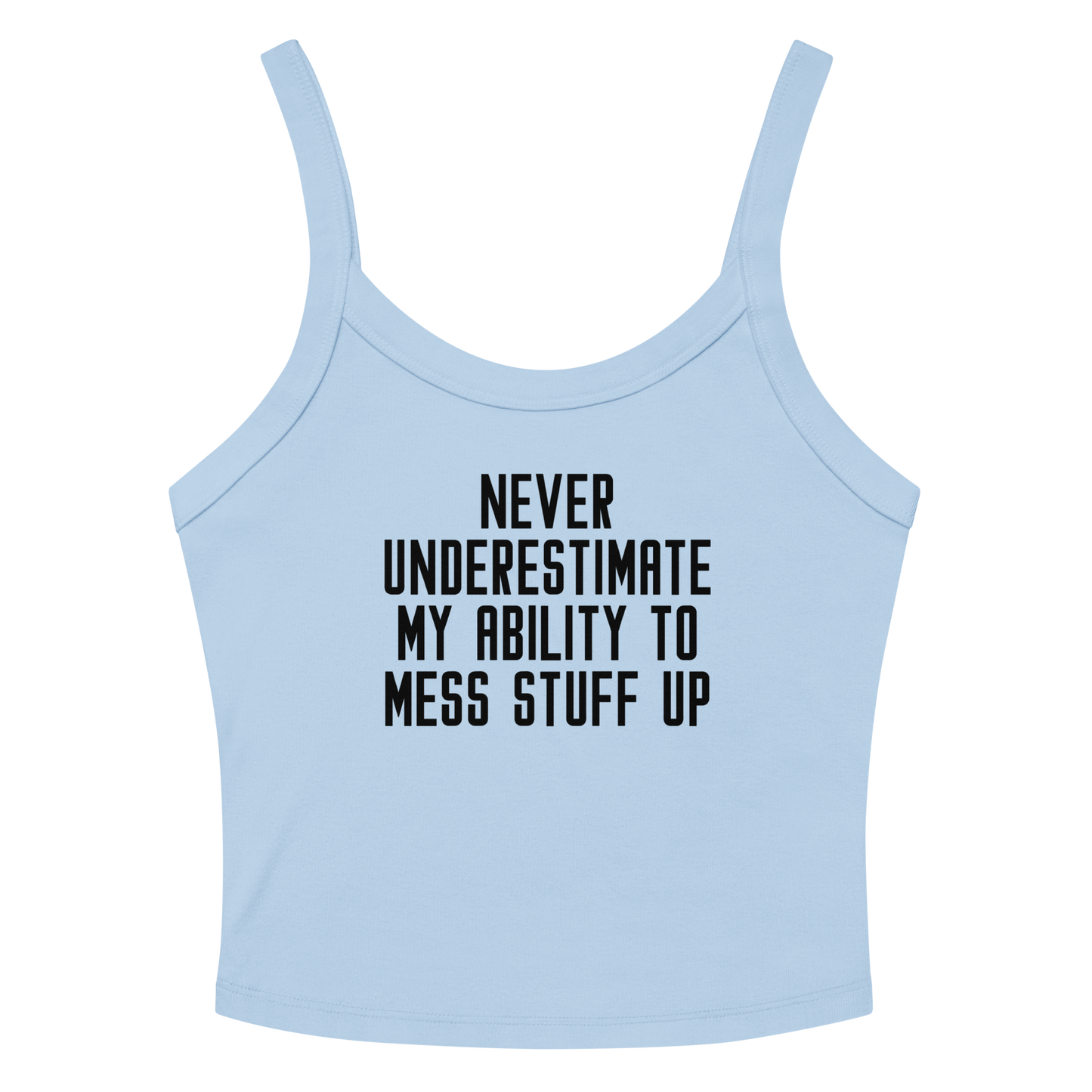"Never Understimate My Ability To Mess Stuff Up" printed on a solid baby blue blend women's micro-rib tanktop laying on a flat surface amongst sunglasses and shorts