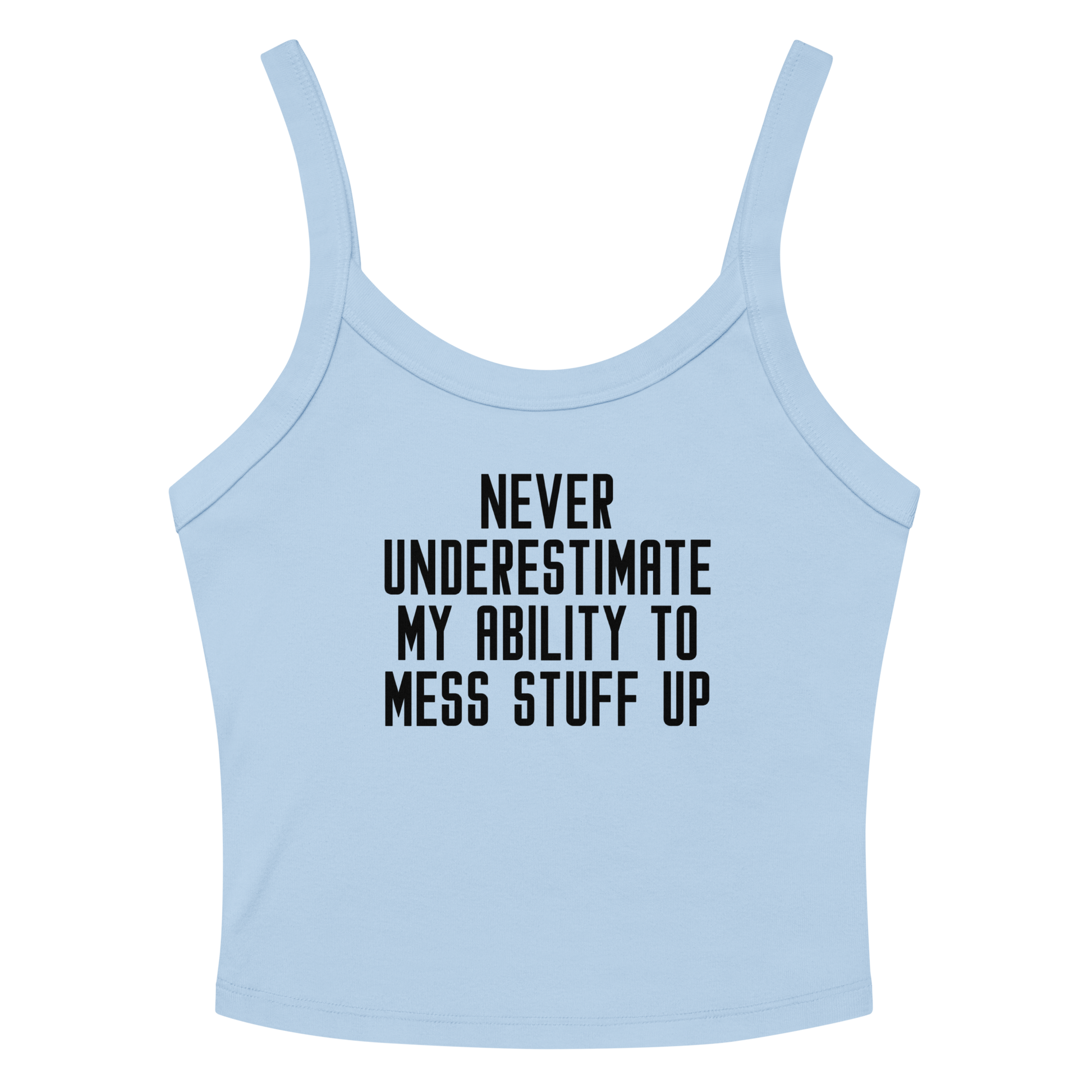 "Never Understimate My Ability To Mess Stuff Up" printed on a solid baby blue blend women's micro-rib tanktop laying on a flat surface amongst sunglasses and shorts