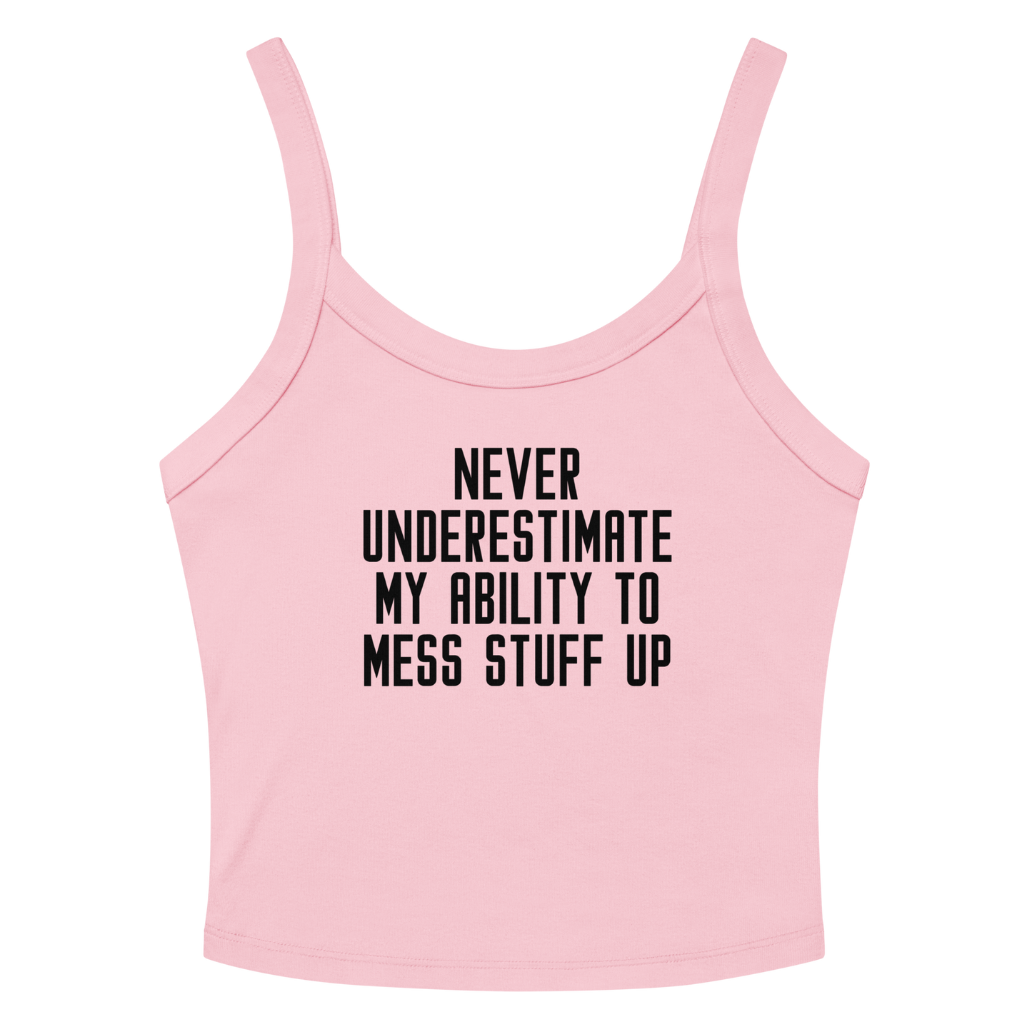 "Never Understimate My Ability To Mess Stuff Up" printed on a solid pink blend women's micro-rib tanktop laying on a flat surface amongst sunglasses and shorts