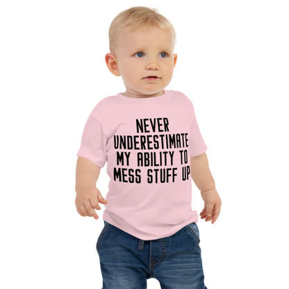 "Never Understimate My Ability To Mess Stuff Up" printed on a pink baby jersey short sleeve tee worn by a male
