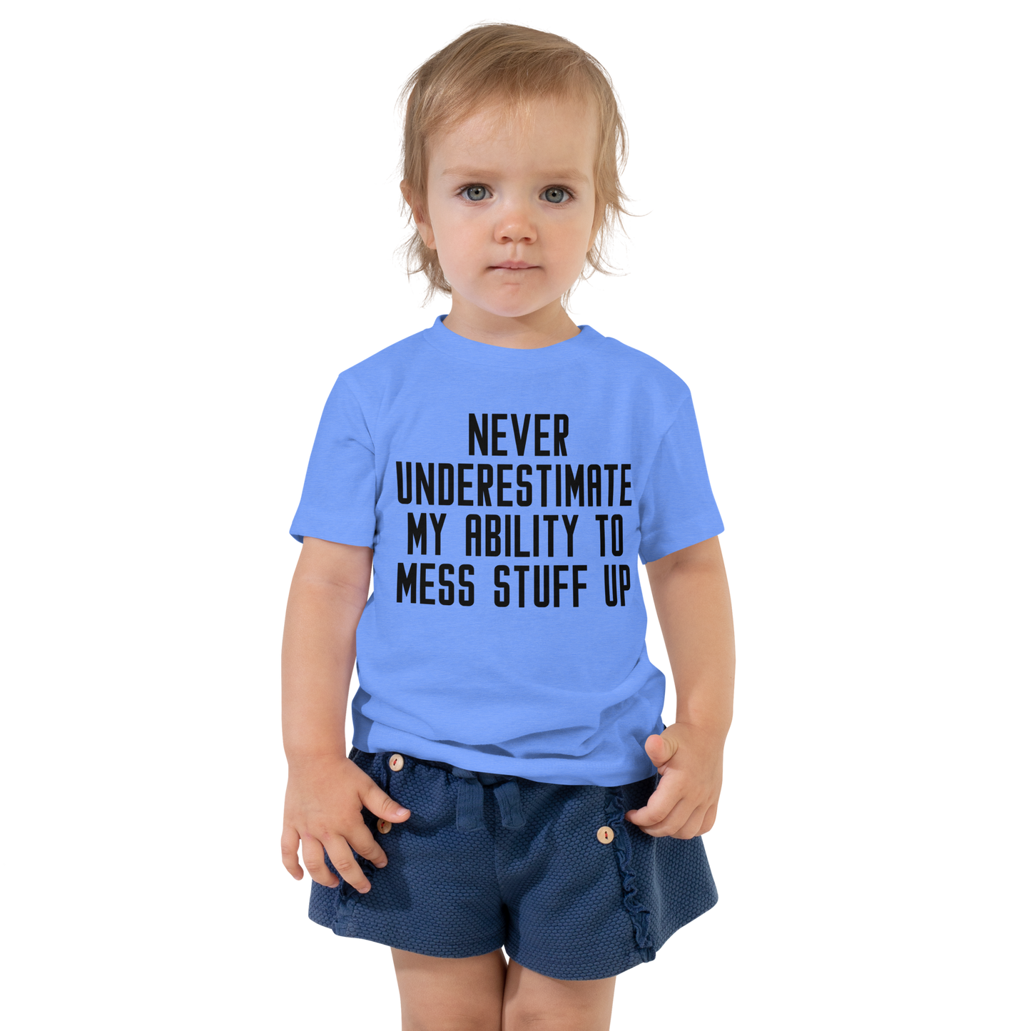 "Never Understimate My Ability To Mess Stuff Up" printed on a heather columbia blue toddler short sleeve tee worn by a female