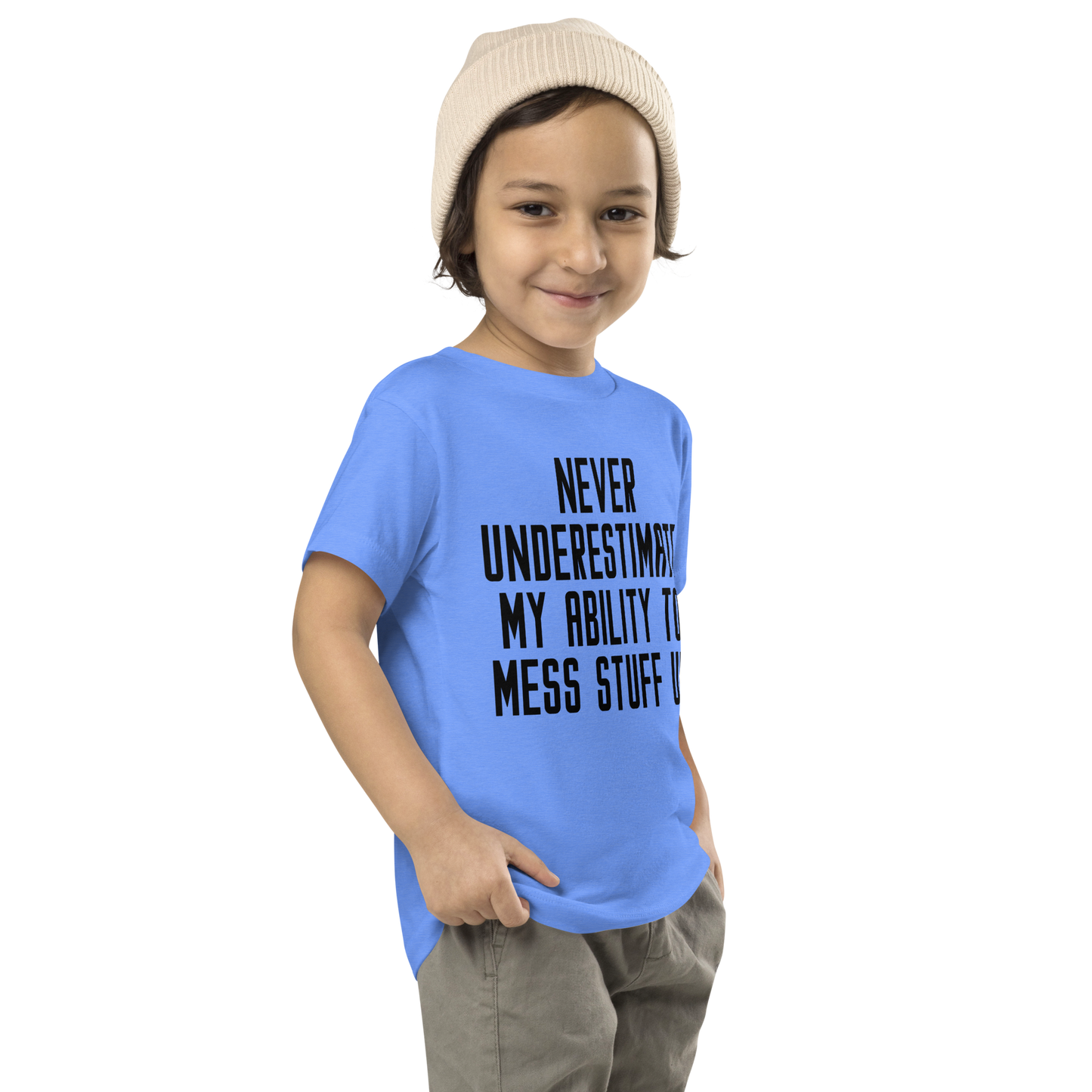 "Never Understimate My Ability To Mess Stuff Up" printed on a heather columbia blue toddler short sleeve tee worn by a male who is also wearing a knit cap