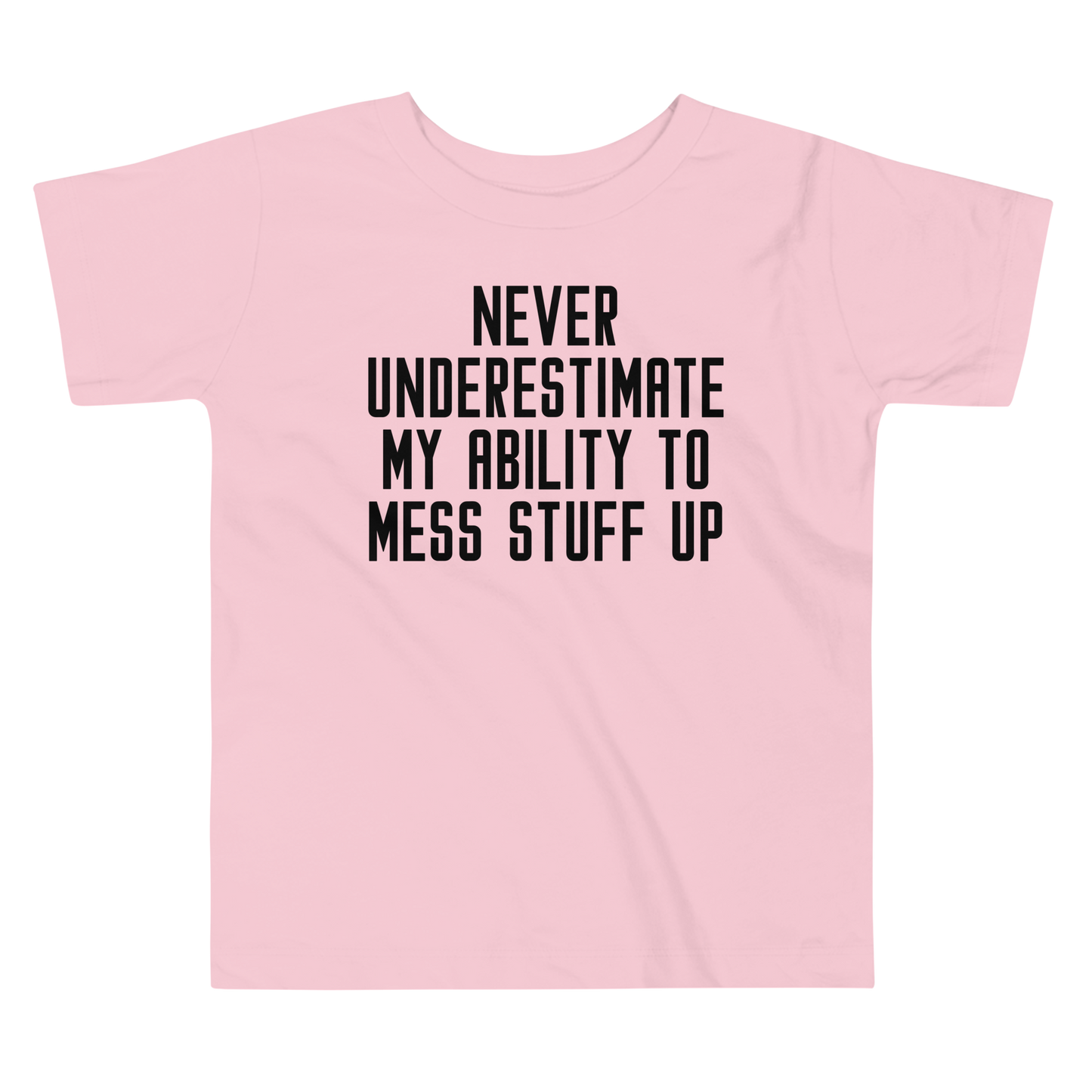 "Never Understimate My Ability To Mess Stuff Up" printed on a pink toddler short sleeve tee laying on a flat surface
