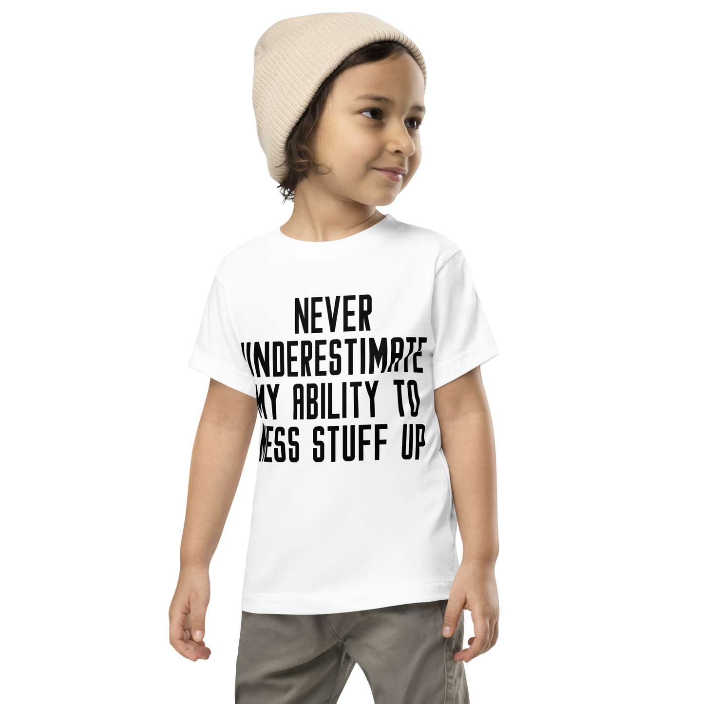 "Never Understimate My Ability To Mess Stuff Up" printed on a white toddler short sleeve tee worn by a male wearing a cap