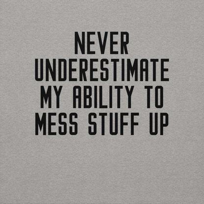 "Never Understimate My Ability To Mess Stuff Up" printed on a carbon grey background