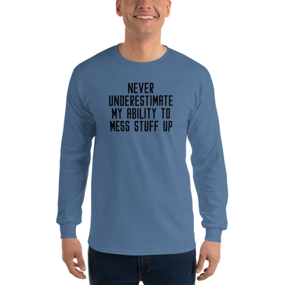 "Never Understimate My Ability To Mess Stuff Up" printed on a indigo blue men's long sleeve shirt worn by a male