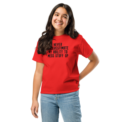 "Never Understimate My Ability To Mess Stuff Up" printed on a red youth classic tee worn by a female