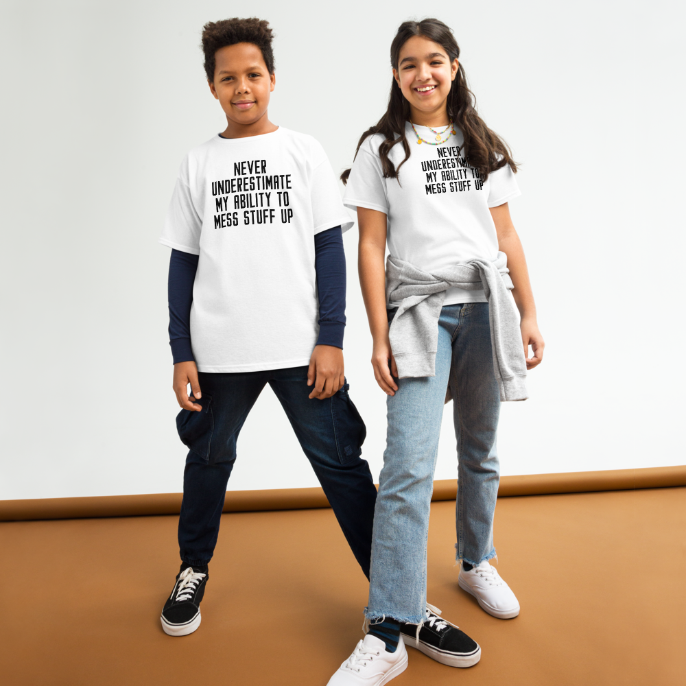 "Never Understimate My Ability To Mess Stuff Up" printed on a white youth classic tee worn by a female and male
