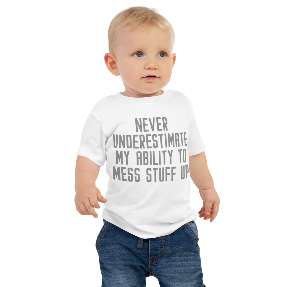 "Never Understimate My Ability To Mess Stuff Up" printed on a white baby jersey short sleeve tee worn by a male