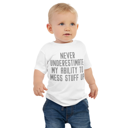 "Never Understimate My Ability To Mess Stuff Up" printed on a white baby jersey short sleeve tee worn by a male