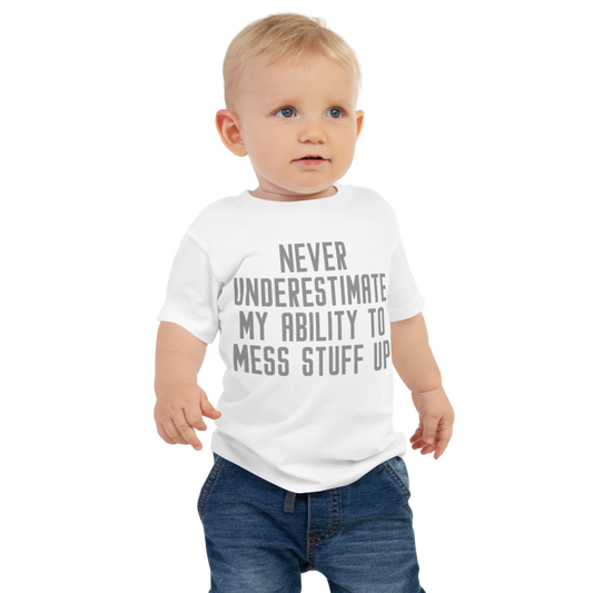 "Never Understimate My Ability To Mess Stuff Up" printed on a white baby jersey short sleeve tee worn by a male