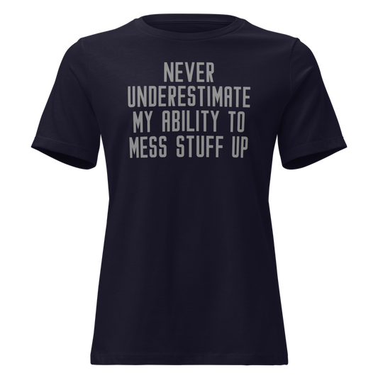 "Never Understimate My Ability To Mess Stuff Up" printed on a navy on an invisible / simulated body