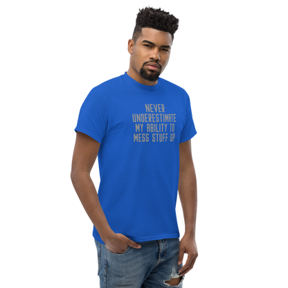 "Never Understimate My Ability To Mess Stuff Up" printed on a royal unisex classic tee worn by a male